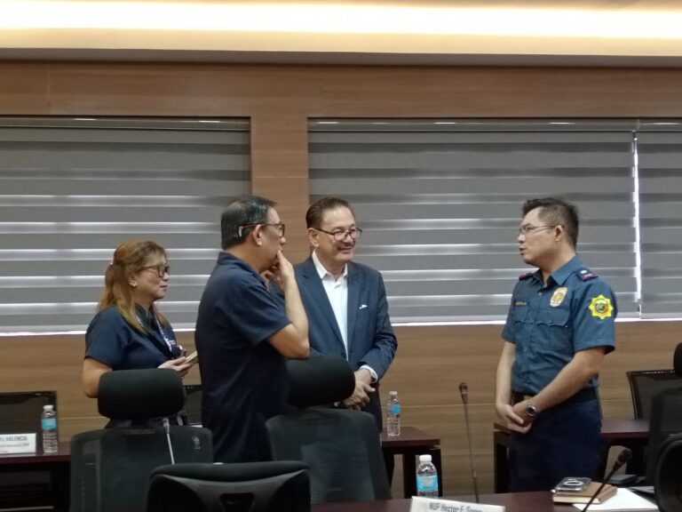 Eye Bank and PNP officials in conversation in the conference room