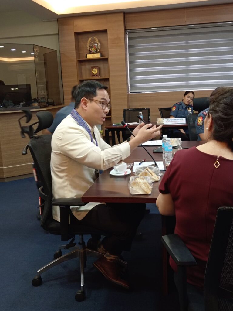 Participant in a barong speaking during the meeting